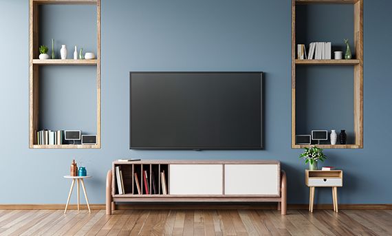 blue colour background with bookshelf storage tv unit design